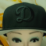 Jockey New Era 9FIFTY Snapback Negro con Letra "D" en relieve