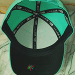 gorra New Era 9FIFTY Snapback San Diego Padres color verde aqua con detalles rosa.